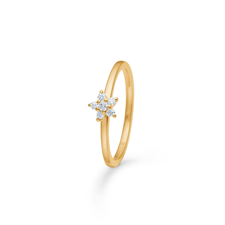 Guldbring med blomstermotiv besat med små diamanter på en slank ring i gult guld. Model 12345