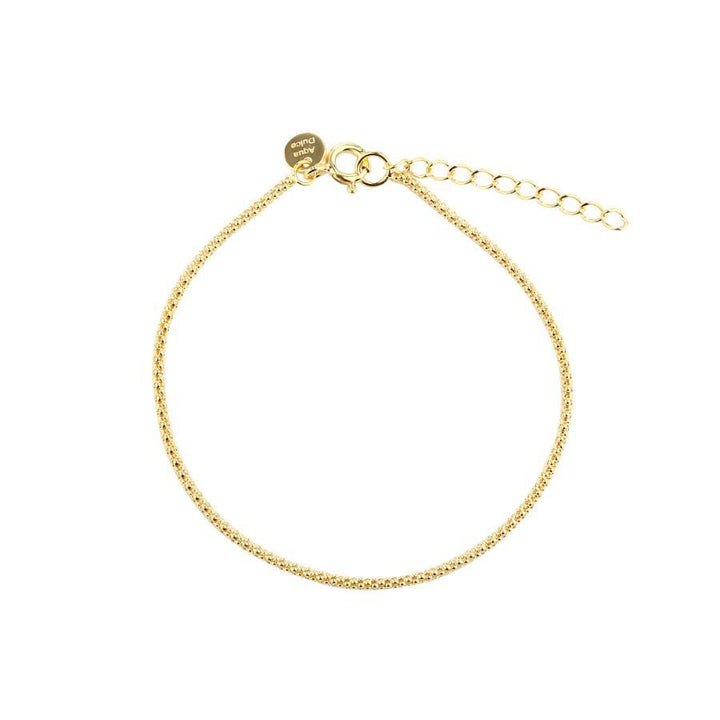 Aqua Dulce Popcorn Armband guldpläterat visas som ett enkelt, fint guldarmband med justerbar kedja. Modell 6012-6012-1