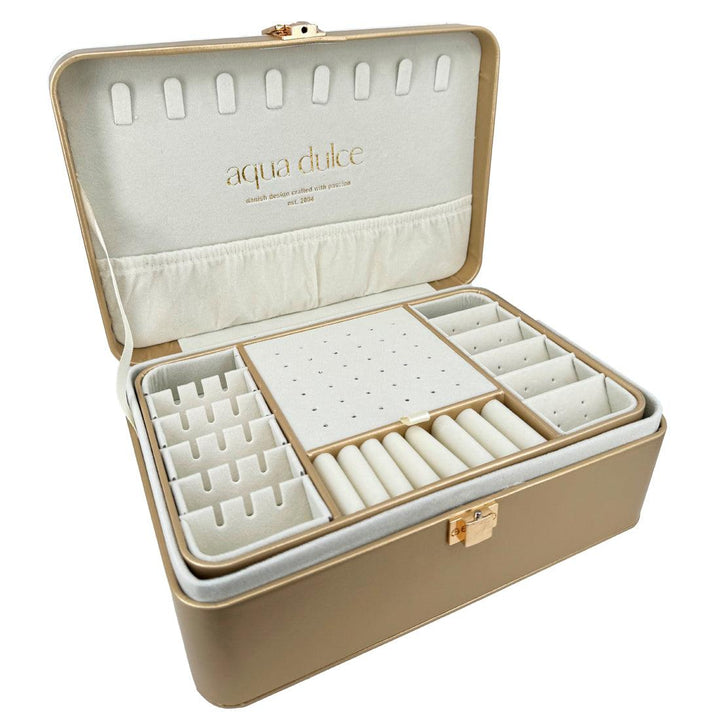 Aqua Dulce stor smyckeskrin i guld konstläder med fack och mjukt ljus inredning. Modell 6053-1