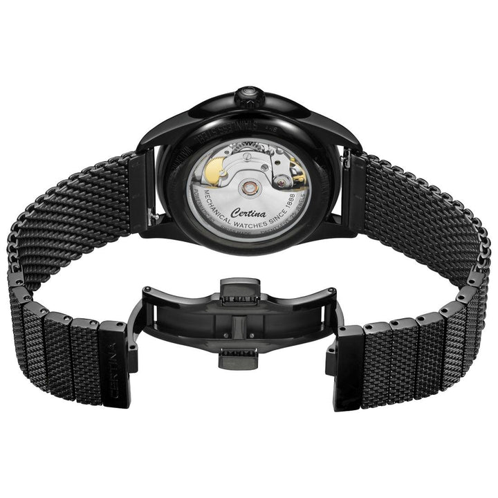Certina DS-1 Automatic Black PVD visar rörelsen genom genomskinlig baksida med svart mesharmband. Modell C0298073305100