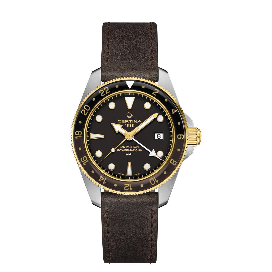 Certina DS Action GMT Powermatic 80 med svart urtavla, gulddetaljer och brunt läderband. Modell C0329292605100