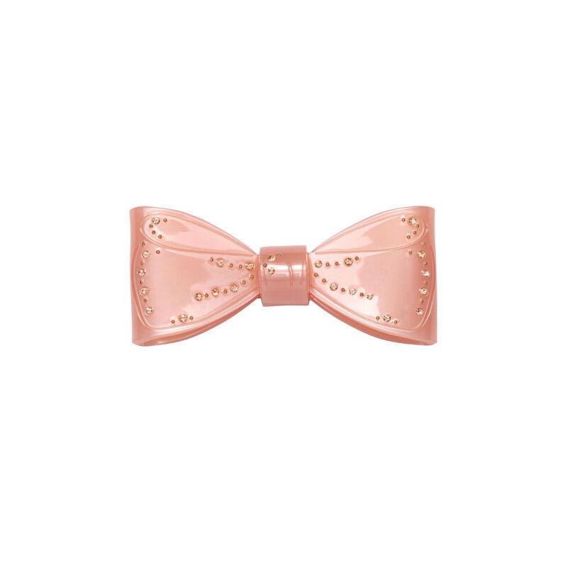 Maanesten Ribin Hair Clip Blush har en rosa hårspänne med gyllene rosettdetaljer. Modell 3979-one size.