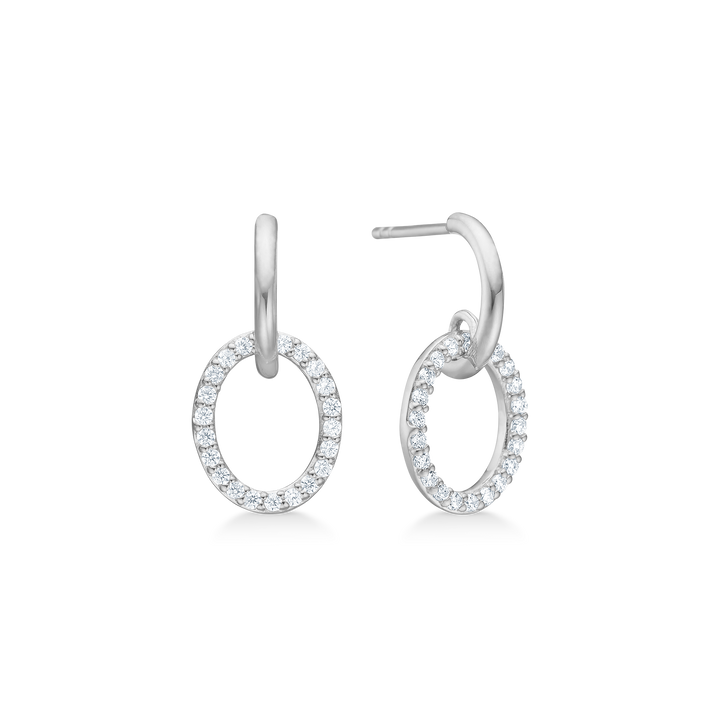 Mads Z Viola örhängen i silver med cirkulär ring dekorerad med klara stenar, modell 3117004-1