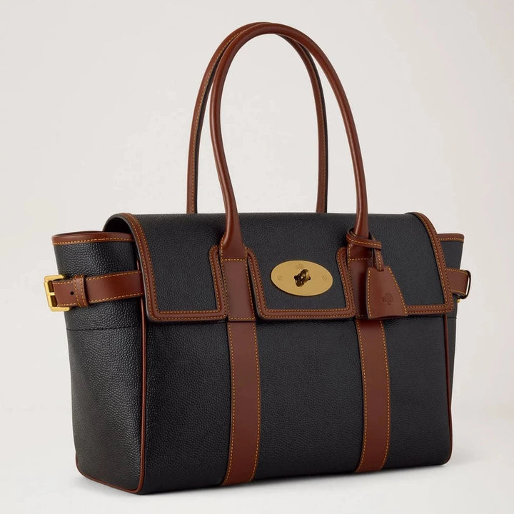 Mulberry Bayswater Black and Cognac Bio-Based Scotchgrain handväska i svart och cognac med gulddetaljer. Modell HH0014127A340