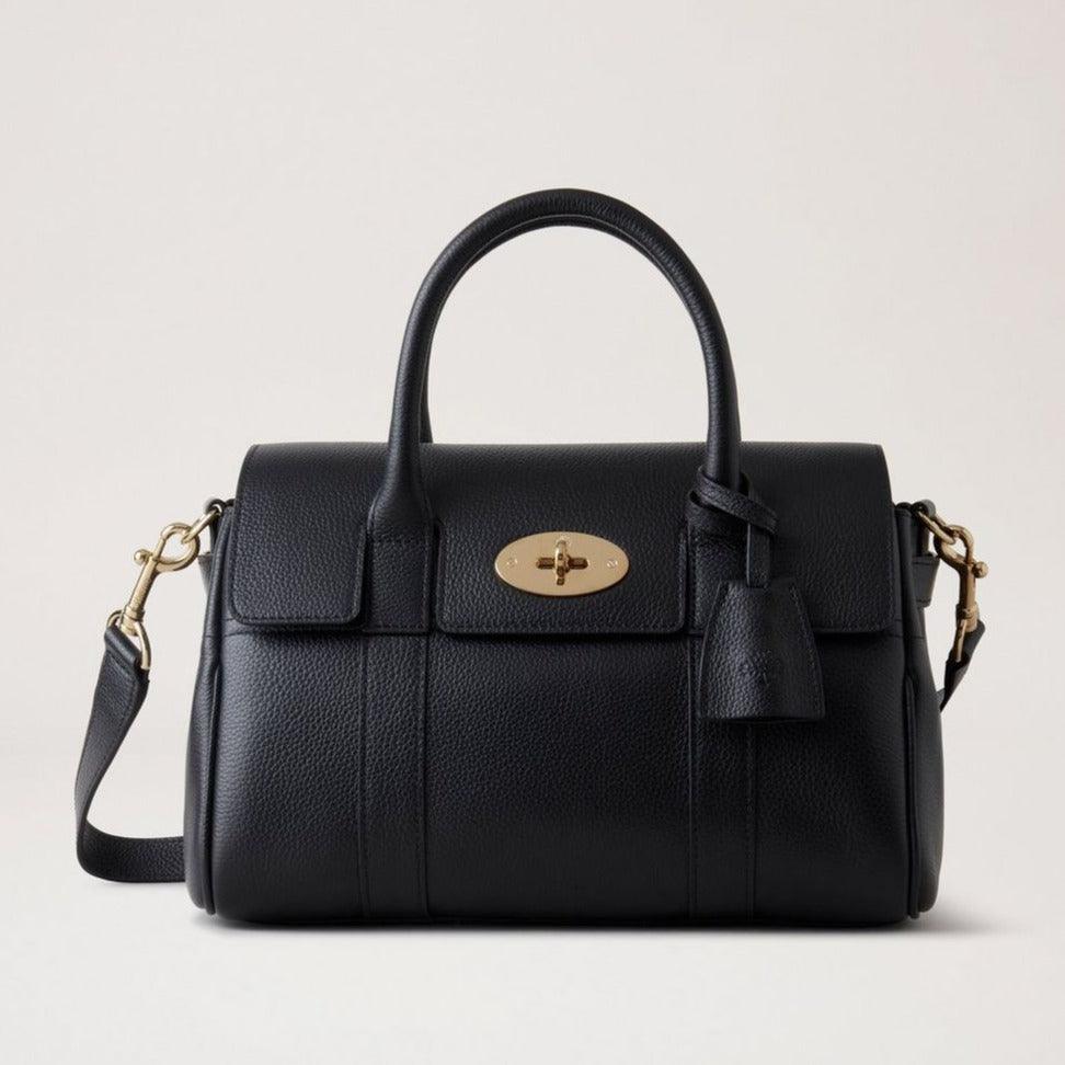 Mulberry Bayswater Satchel Black Small Classic Grain visar en elegant svart läderhandväska med gulddetaljer. Modell HH9216205A100.