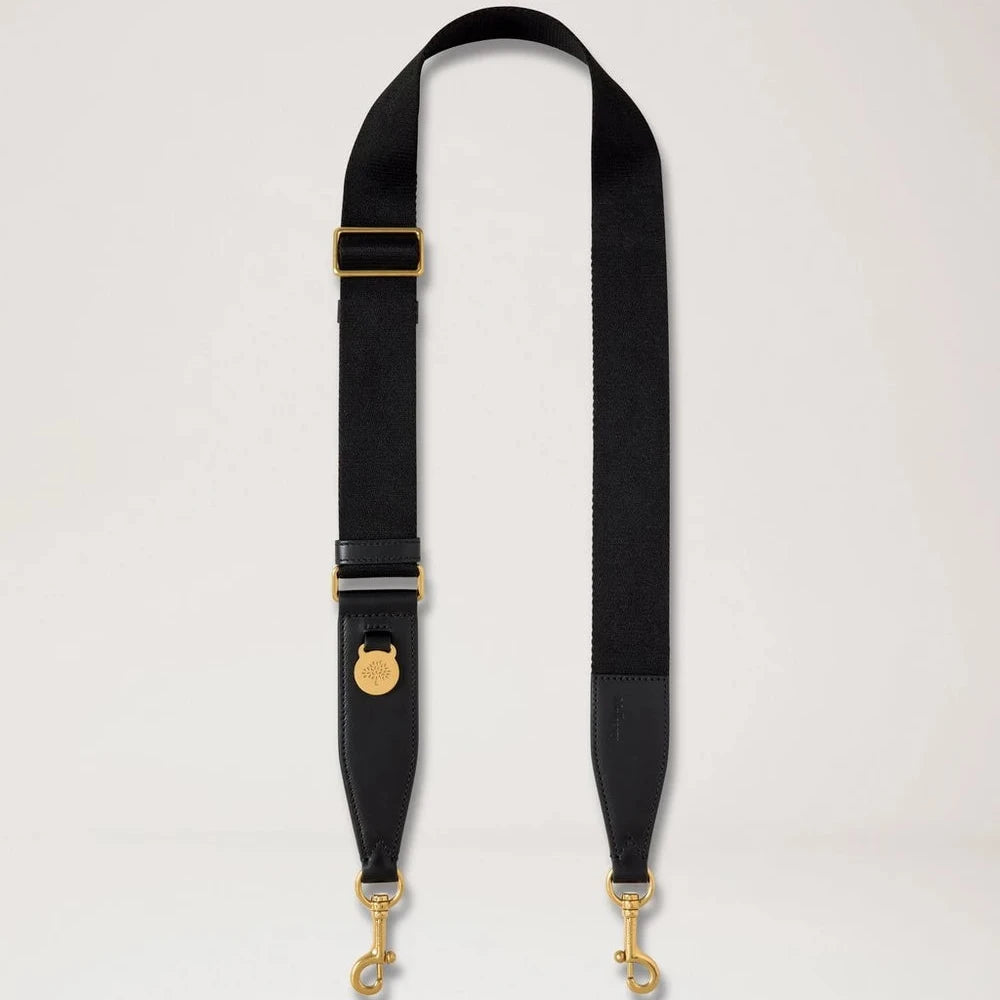 Mulberry Black Medallion Flat Leather and Webbing Strap i svart läder och tyg med guldfärgade detaljer. Modell RX0310000A100