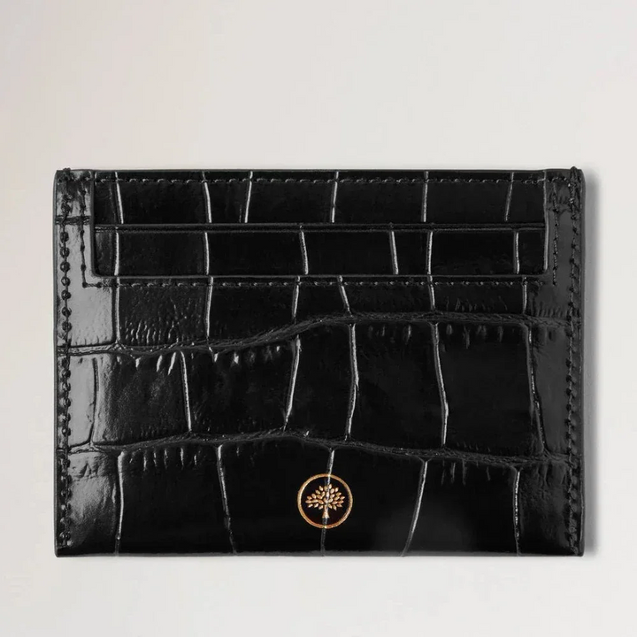 Mulberry Kreditkortsslip Black Shiny Small Croc visar upp ett smalt kortfodral i svart glänsande krokodil. Modell RL8748641A100.