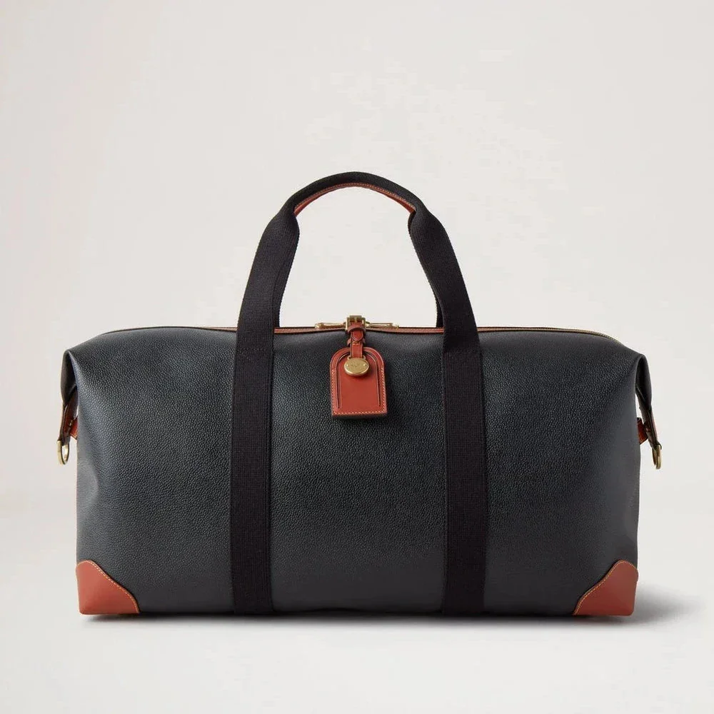 Mulberry Heritage Medium Clipper i svart och cognac scotchgrain med läderdetaljer på framsidan. Modell HL5136127A340