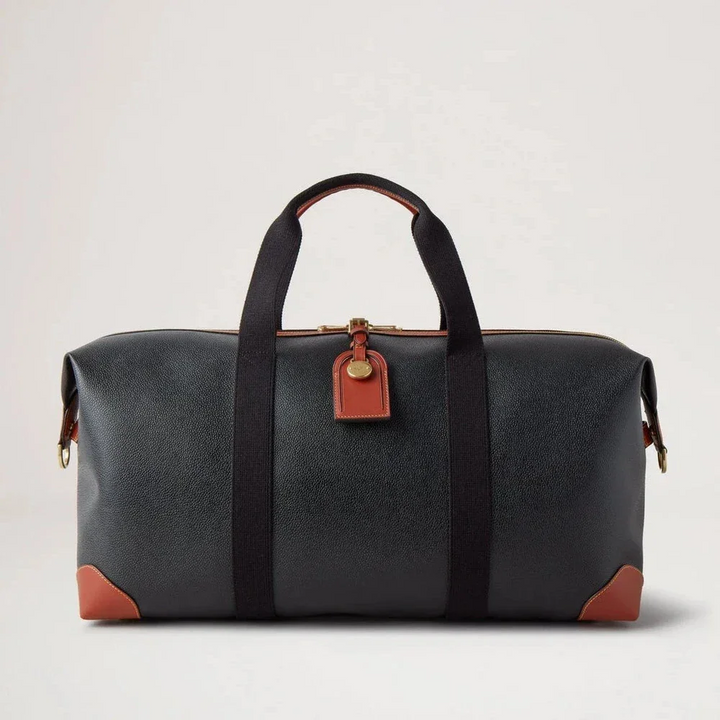 Mulberry Heritage Medium Clipper i svart och cognac scotchgrain med läderdetaljer på framsidan. Modell HL5136127A340