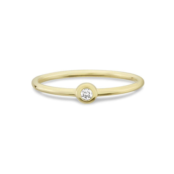 Nuran Zoe 14k guldring med enkelcenter diamant, elegant och enkel stil. Modell R2314-003RG-001