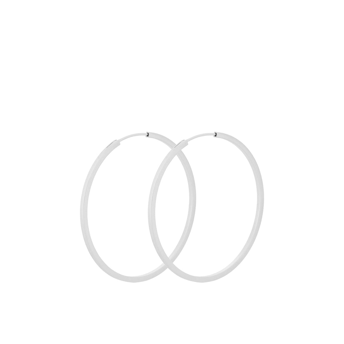 Pernille Corydon Small Orbit Hoops i silver, två enkla ringar i minimalistisk stil. Modell E-052-S-1.