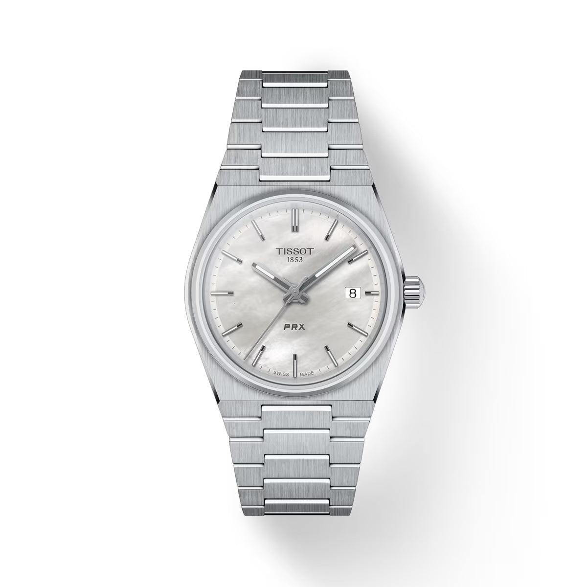 Tissot PRX 35 mm urtavla med vit pärlemor på stållänk, elegant omslagsbild. Modell T1372101111100