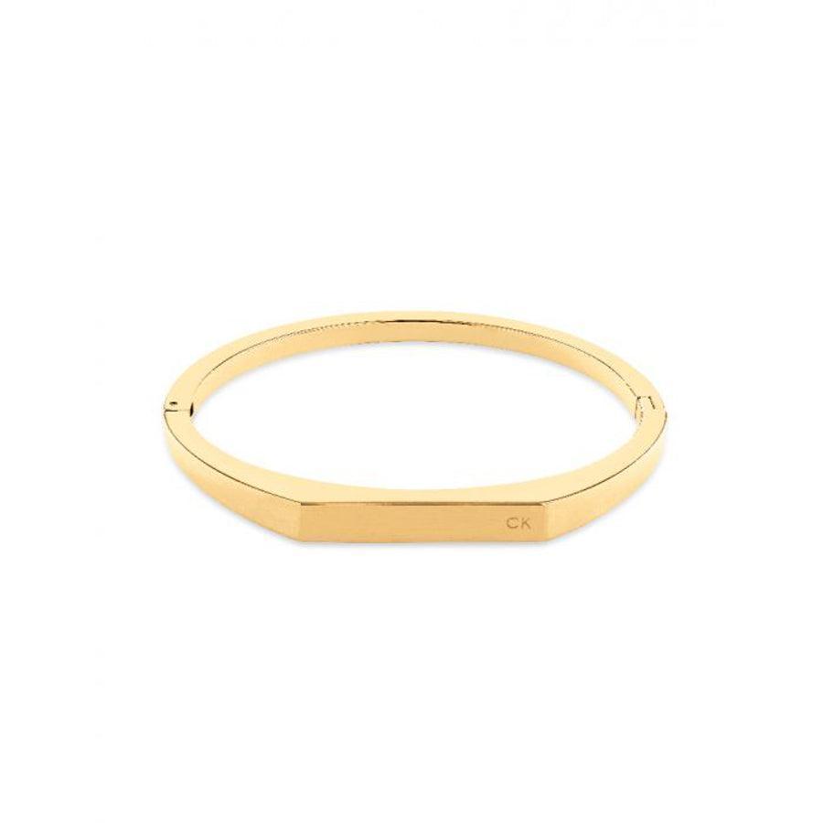 Calvin Klein Faceted Bar Armring Svart Guld, elegant facetterad guldarmring med slät yta. Modell 35000046-35000046