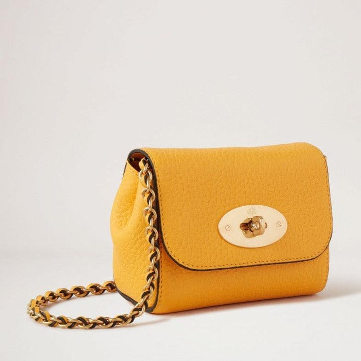 Mulberry Mini Lily Dubbelgul clutch i gult läder med kedjeband och guldmetallspänne. Modell RL7749736P677
