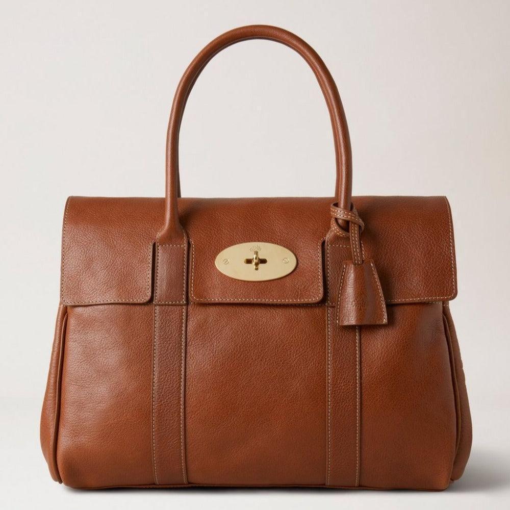 Mulberry Väska Bayswater Arv NVT visar strukturerad brun läderväska med klassiskt guldspänne, modell HH7941275G110