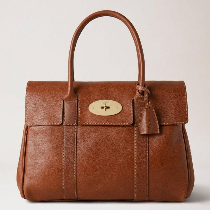 Mulberry Väska Bayswater Arv NVT visar strukturerad brun läderväska med klassiskt guldspänne, modell HH7941275G110