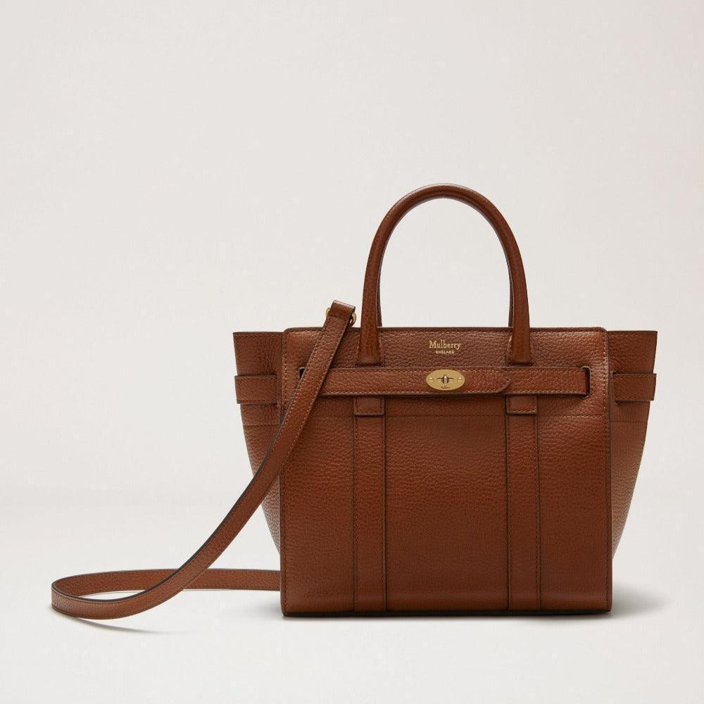 Mulberry Väska med mini dragkedja Bayswater Ek i slätt brunt läder med dragkedja, handtag och axelrem. Modell HH8730552G110